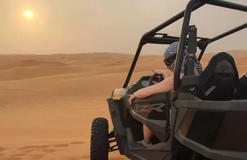 quad riding during evening desert safari in uae